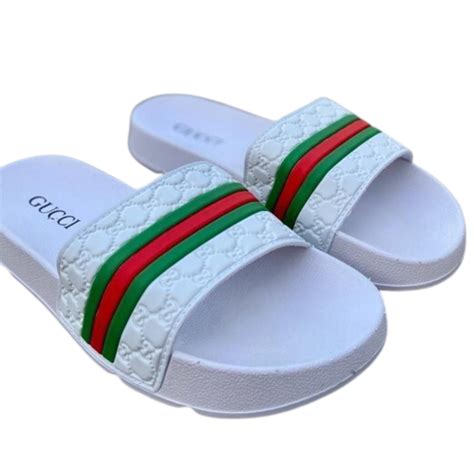 chinelo slide masculino gucci|Gucci men's sliders.